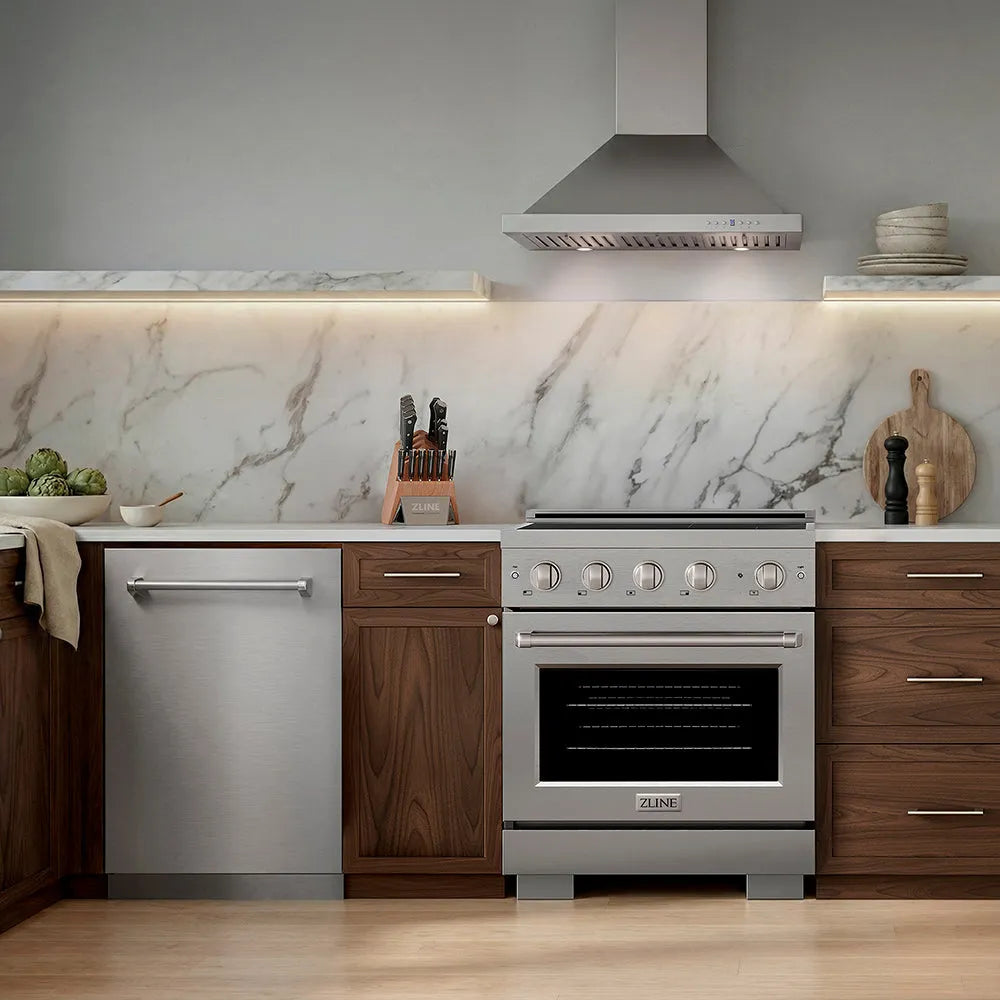 A modern kitchen scene featuring a stainless steel freestanding gas range with a ZLINE 30 in. Convertible Vent Wall Mount Range Hood in Stainless Steel (KB-30), a matching dishwasher, dark wood cabinets, and a white marble backsplash.