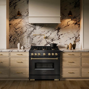 ZLINE Autograph Edition 36 in. 5.2 cu. ft. Classic Gas Range with 6 Burner DuoPro™ Cooktop and Convection Gas Oven in Black Stainless Steel and Champagne Bronze Accents (PCGRBZ-36-CB) in a custom kitchen against a marble backsplash, front.