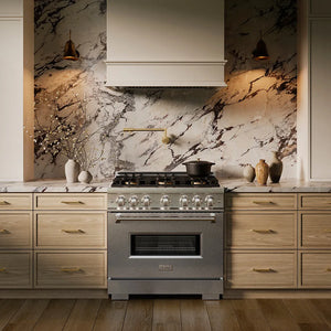 ZLINE 36 in. 5.2 cu. ft. Classic Gas Range with 6 Burner DuoPro™ Cooktop and Convection Gas Oven in Satin Stainless Steel (PCGRS-36) in a custom kitchen against a marble backsplash, front.