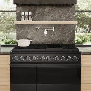 ZLINE 48 in. 6.7 cu. ft. Marino Double Oven Gas Range with 8 Burner Cooktop in Black Stainless Steel (MGRB-48) front close-up, in a modern kitchen with a dark marble backsplash, light wood shelves, and a white pot on the cooktop.