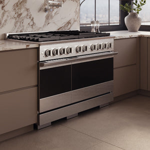 ZLINE 48 in. 6.7 cu. ft. Marino Double Oven Dual Fuel Range with 8 Burner Gas Cooktop in Satin Stainless Steel (MDRS-48) side, set in a modern kitchen with beige cabinets and a marble backsplash.