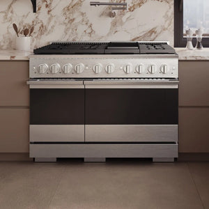 ZLINE 48 in. 6.7 cu. ft. Marino Dual Fuel Range with 8 Burner DuoPro™ Cooktop and Dual Ovens in Satin Stainless Steel (PMDRS-48) front, set in a modern kitchen with beige cabinets and a marble backsplash.