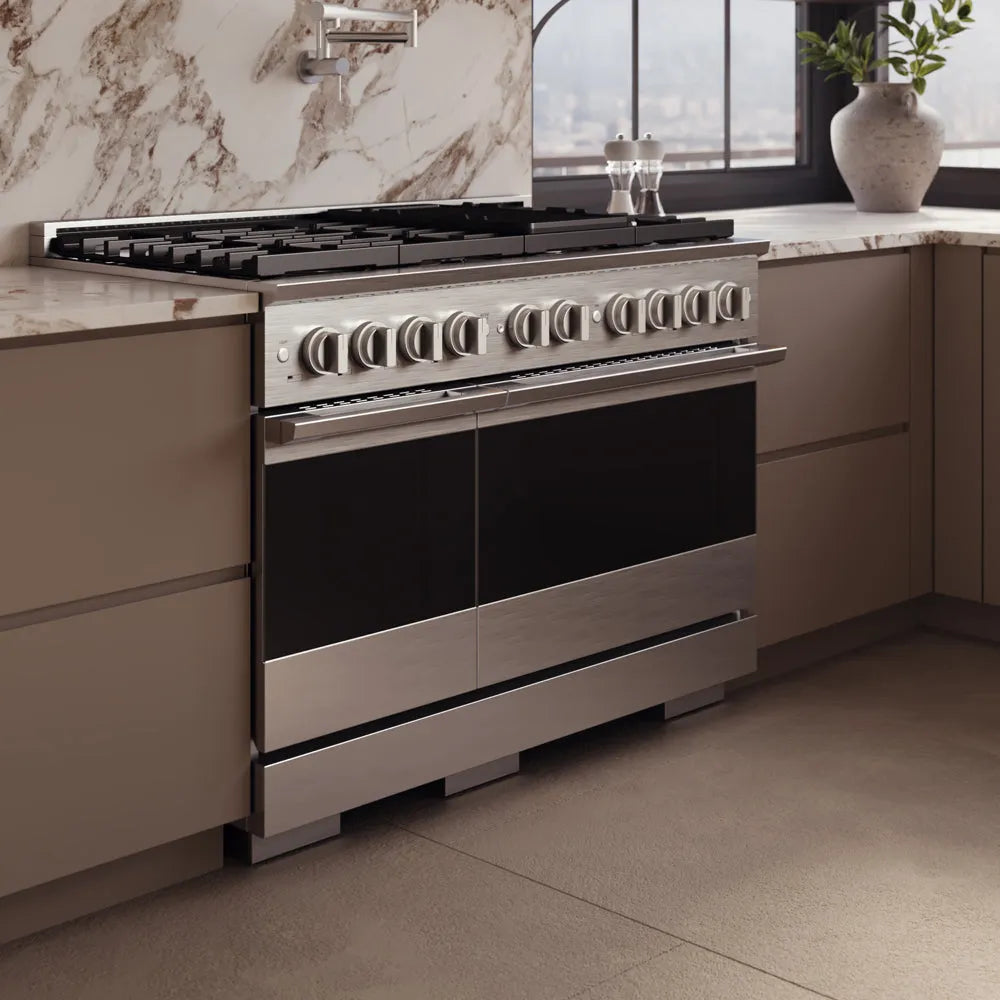 ZLINE 48 in. 6.7 cu. ft. Marino Gas Range with 8 Burner DuoPro™ Cooktop and Dual Ovens in Stainless Steel (PMGR48), side, set in a modern kitchen with beige cabinets and a marble backsplash.