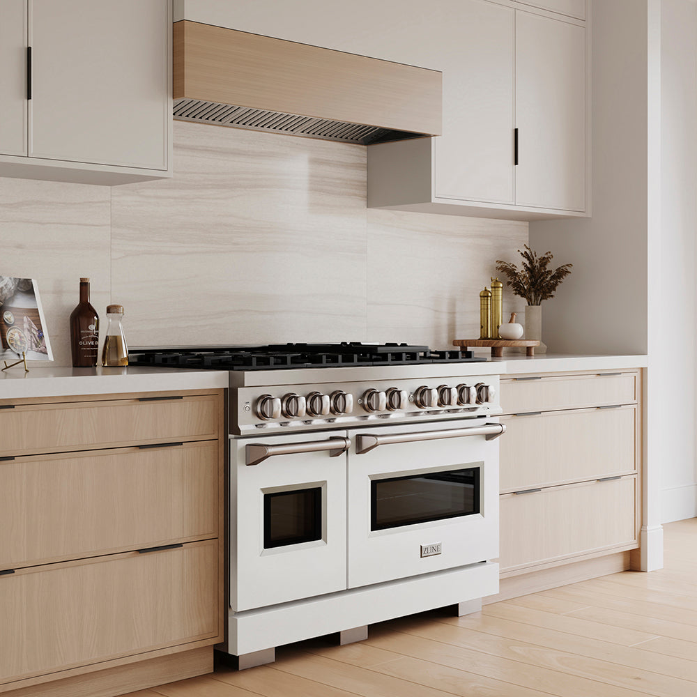 ZLINE 48 in. 6.7 cu. ft. Classic Dual Fuel Range with 8 Burner DuoPro™ Cooktop and Dual Ovens with White Matte Doors (PCDR-WM-48) in a custom kitchen with wooden cabinets and white walls, side.