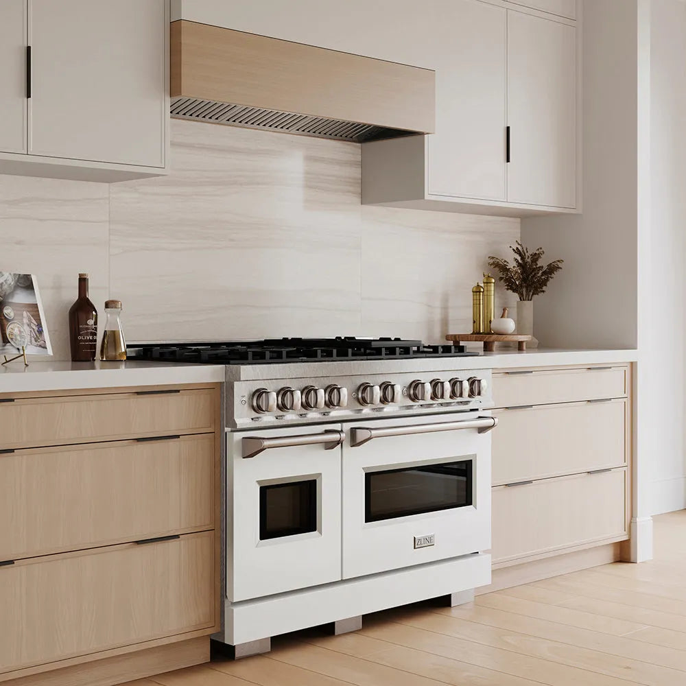 ZLINE 48 in. 6.7 cu. ft. Classic Dual Fuel Range with 8 Burner DuoPro™ Cooktop and Dual Ovens in Satin Stainless Steel with White Matte Doors (PCDRS-WM-48) in a custom kitchen with wooden cabinets and white walls, side.
