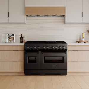ZLINE 48 in. 6.7 cu. ft. Classic Gas Range with 8 Burner DuoPro™ Cooktop and Dual Ovens in Black Stainless Steel (PCGRB-48) in a custom kitchen with wooden cabinets and white walls, front.