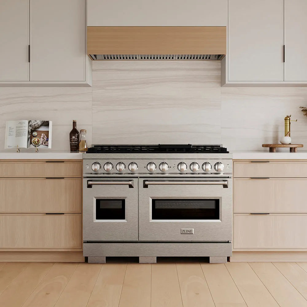 ZLINE 48 in. 6.7 cu. ft. Classic Dual Fuel Range with 8 Burner DuoPro™ Cooktop and Dual Ovens in Satin Stainless Steel (PCDRS-48) in a custom kitchen with wooden cabinets and white walls, front.