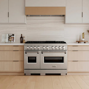 ZLINE 48 in. 6.7 cu. ft. Classic Gas Range with 8 Burner DuoPro™ Cooktop and Dual Ovens in Satin Stainless Steel (PCGRS-48) in a custom kitchen with wooden cabinets and white walls, front.