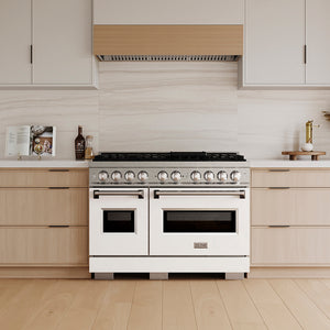 ZLINE 48 in. 6.7 cu. ft. Classic Gas Range with 8 Burner DuoPro™ Cooktop and Dual Ovens in Satin Stainless Steel with White Matte Doors (PCGRS-WM-48) in a custom kitchen with wooden cabinets and white walls, front.
