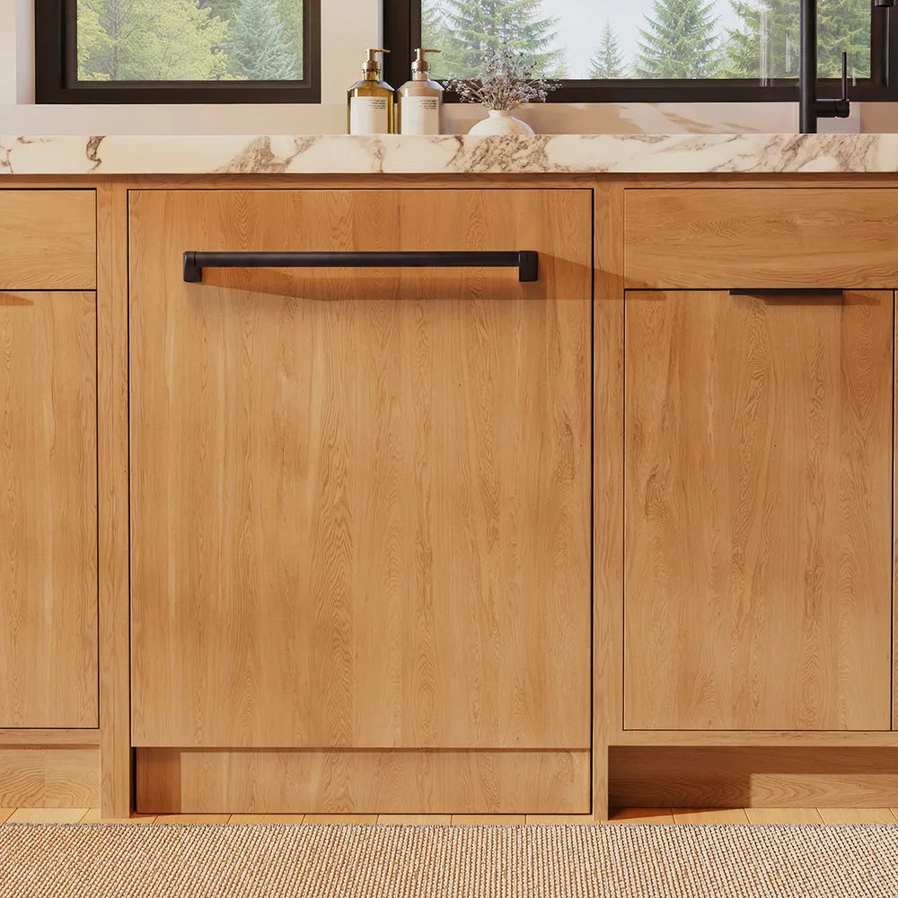 ZLINE Autograph Edition 24 in. Monument Series 3rd Rack Dishwasher with Auto Door Open Drying, 44dBa, Panel Ready with Matte Black Handle (DWMTZ-24-MB) front, in a kitchen with wooden cabinets and a window view.