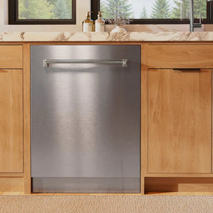 ZLINE Autograph Edition 24 in. Monument Series 3rd Rack Dishwasher with Auto Door Open Drying, 44dBa, Stainless Steel Panel with Polished Nickel Helix Handle (DWMTZ-30424-KPN) front, in a kitchen with wooden cabinets and a window view.