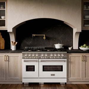 ZLINE 48 in. 6.7 cu. ft. Classic Dual Fuel Range with 8 Burner DuoPro™ Cooktop and Dual Ovens with White Matte Doors (PCDR-WM-48) in a custom kitchen with marble backsplash and large range hood, front.