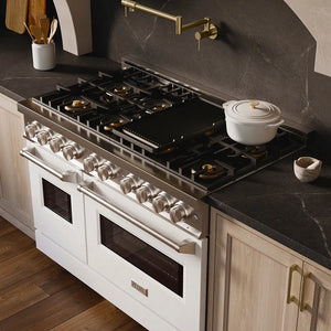 ZLINE 48 in. 6.7 cu. ft. Classic Gas Range with 8 Burner DuoPro™ Cooktop and Dual Ovens with White Matte Doors (PCGR-WM-48) in a custom kitchen with marble backsplash and large range hood, side, above cooktop.