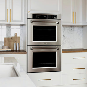 ZLINE 30 in. Professional True Convection Double Wall Oven with Air Fry and Self Clean in Stainless Steel (WAD-30) in a modern kitchen with white cabinets and marble countertops.
