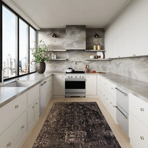 ZLINE 30 in. 4.2 cu. ft. Marino Gas Range with Convection Gas Oven in Stainless Steel with 4 Brass Burners (MGR-BR-30) front, set in a modern kitchen with white cabinetry, marble countertops, a large window overlooking a city skyline, and a potted plant on the counter.