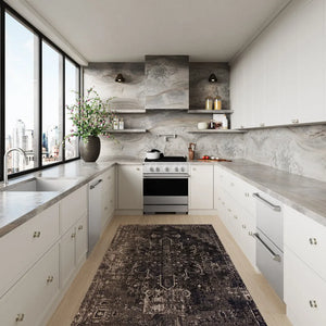 ZLINE 30 in. 4.2 cu. ft. Marino Gas Range with Convection Gas Oven in Satin Stainless Steel with 4 Brass Burners (MGRS-BR-30) front, set in a modern kitchen with white cabinetry, marble countertops, a large window overlooking a city skyline, and a potted plant on the counter.