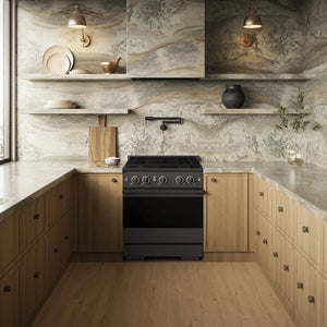 ZLINE 30 in. 4.2 cu. ft. Marino Dual Fuel Range with Gas Cooktop and Electric Convection Oven in Black Stainless Steel with 4 Brass Burners (MDRB-BR-30) front, in a modern U-shaped kitchen with light wood cabinets with marble countertops and backsplash