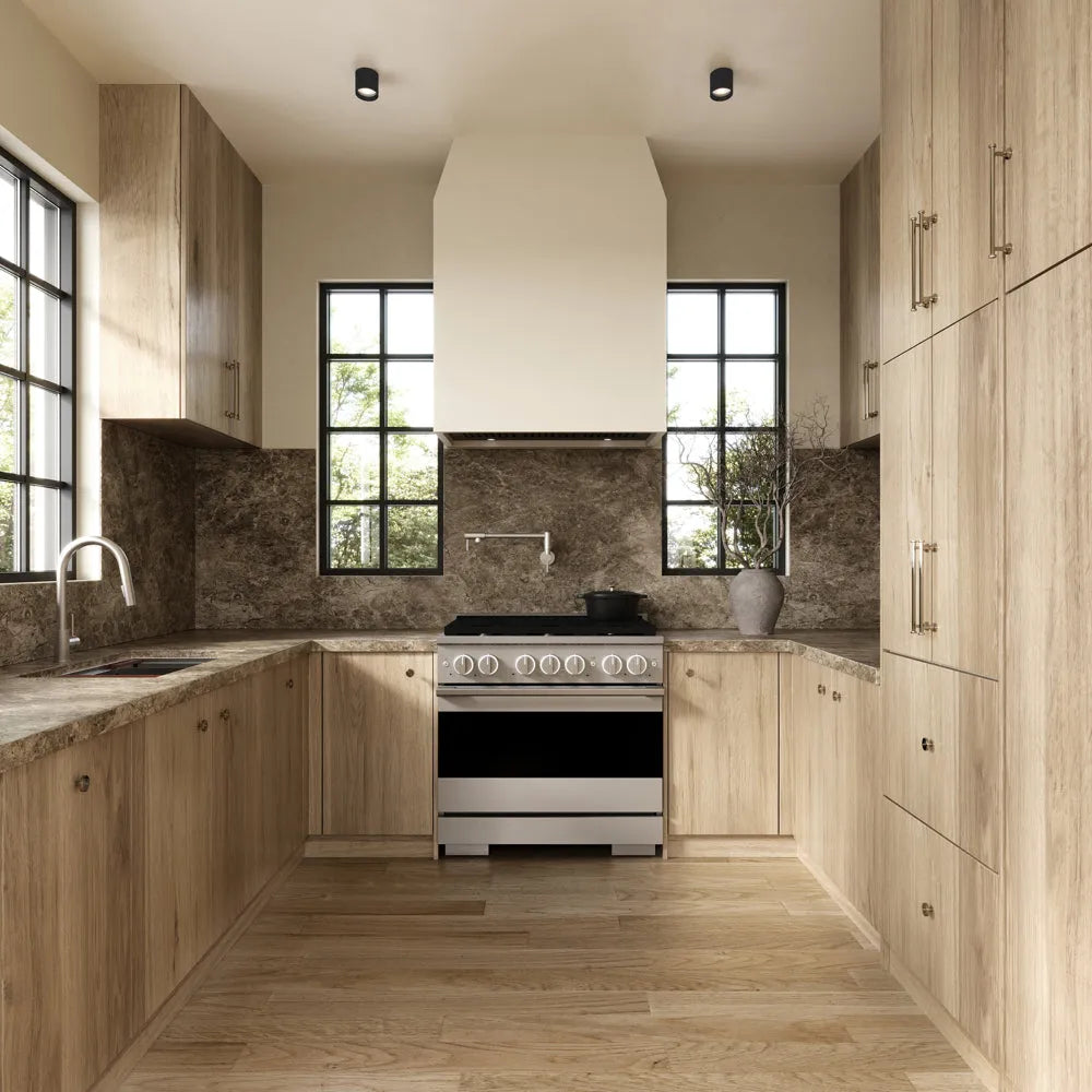 ZLINE 36 in. 5.2 cu. ft. Marino Dual Fuel Range with 6 Burner Gas Cooktop and Electric Convection Oven in Stainless Steel (MDR36) front, set in a modern kitchen with light wood cabinets, a textured stone backsplash, and a black pot on the cooktop.