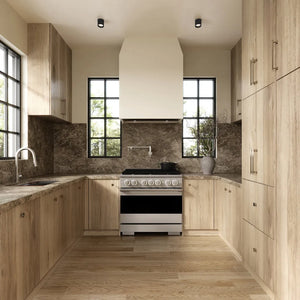 ZLINE 36 in. 5.2 cu. ft. Marino Dual Fuel Range with 6 Burner Gas Cooktop and Electric Convection Oven in Stainless Steel (MDR36) front, set in a modern kitchen with light wood cabinets, a textured stone backsplash, and a black pot on the cooktop.