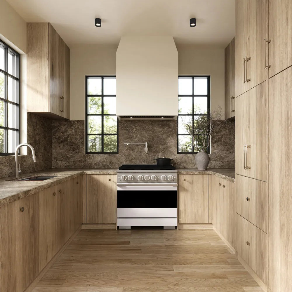 ZLINE 36 in. 5.2 cu. ft. Marino Gas Range with 6 Burner DuoPro™ Cooktop and Convection Gas Oven with White Matte Door (PMGR-WM-36) front, set in a modern kitchen with light wood cabinets, a textured stone backsplash, and a black pot on the cooktop.