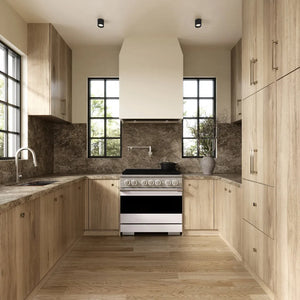 ZLINE 36 in. 5.2 cu. ft. Marino Gas Range with 6 Burner DuoPro™ Cooktop and Convection Gas Oven with White Matte Door (PMGR-WM-36) front, set in a modern kitchen with light wood cabinets, a textured stone backsplash, and a black pot on the cooktop.