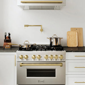 ZLINE Autograph Edition 36 in. 4.6 cu. ft. Legacy Dual Fuel Range with 6 Burner Gas Cooktop and Electric Convection Oven in Stainless Steel and Champagne Bronze Accents (RAZ-36-CB) in a luxury kitchen