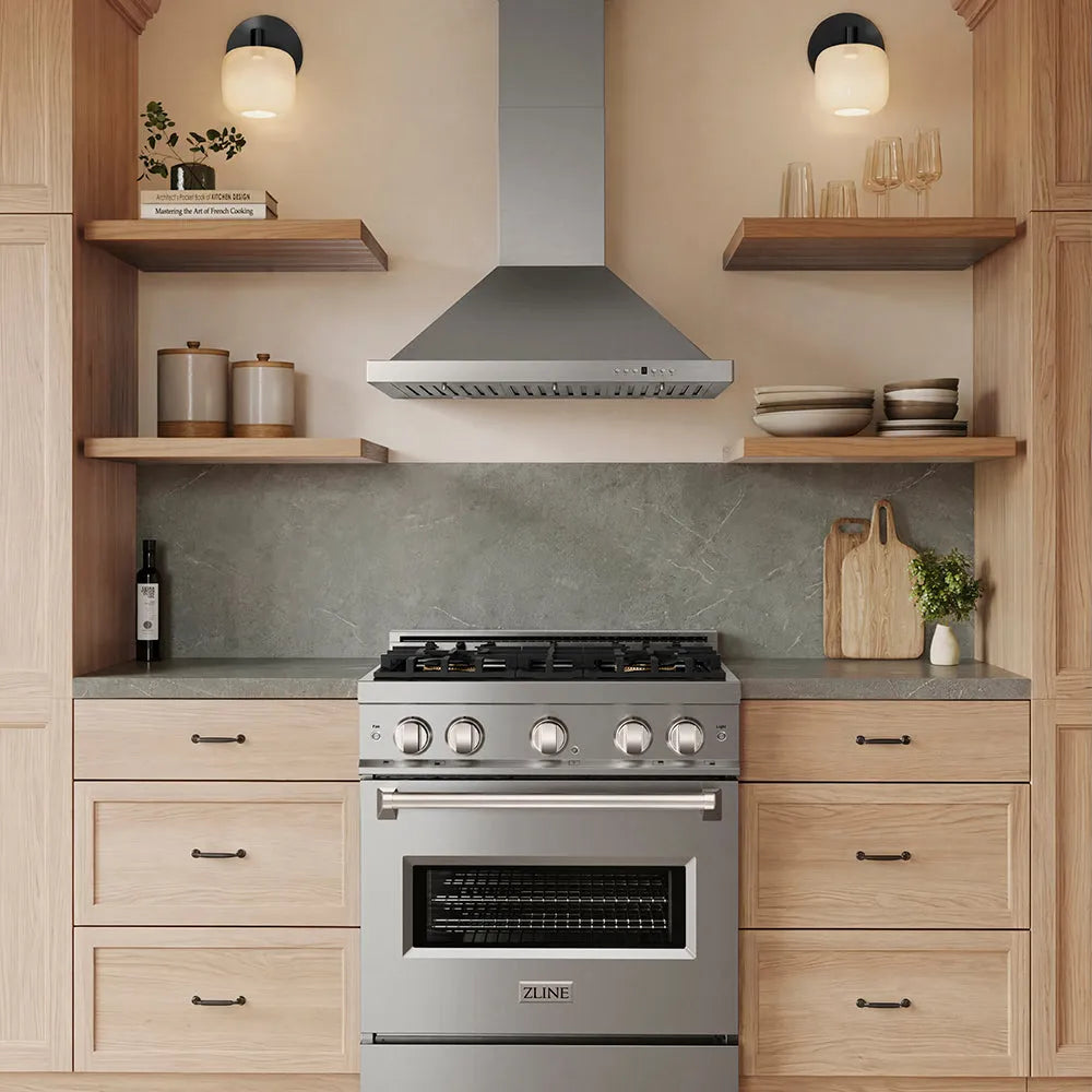 A stainless steel ZLINE gas range and matching ZLINE 30 in. Convertible Vent Wall Mount Range Hood in Stainless Steel (KB-30) installed in a modern kitchen with light wood cabinets, open shelves, and a gray stone backsplash.