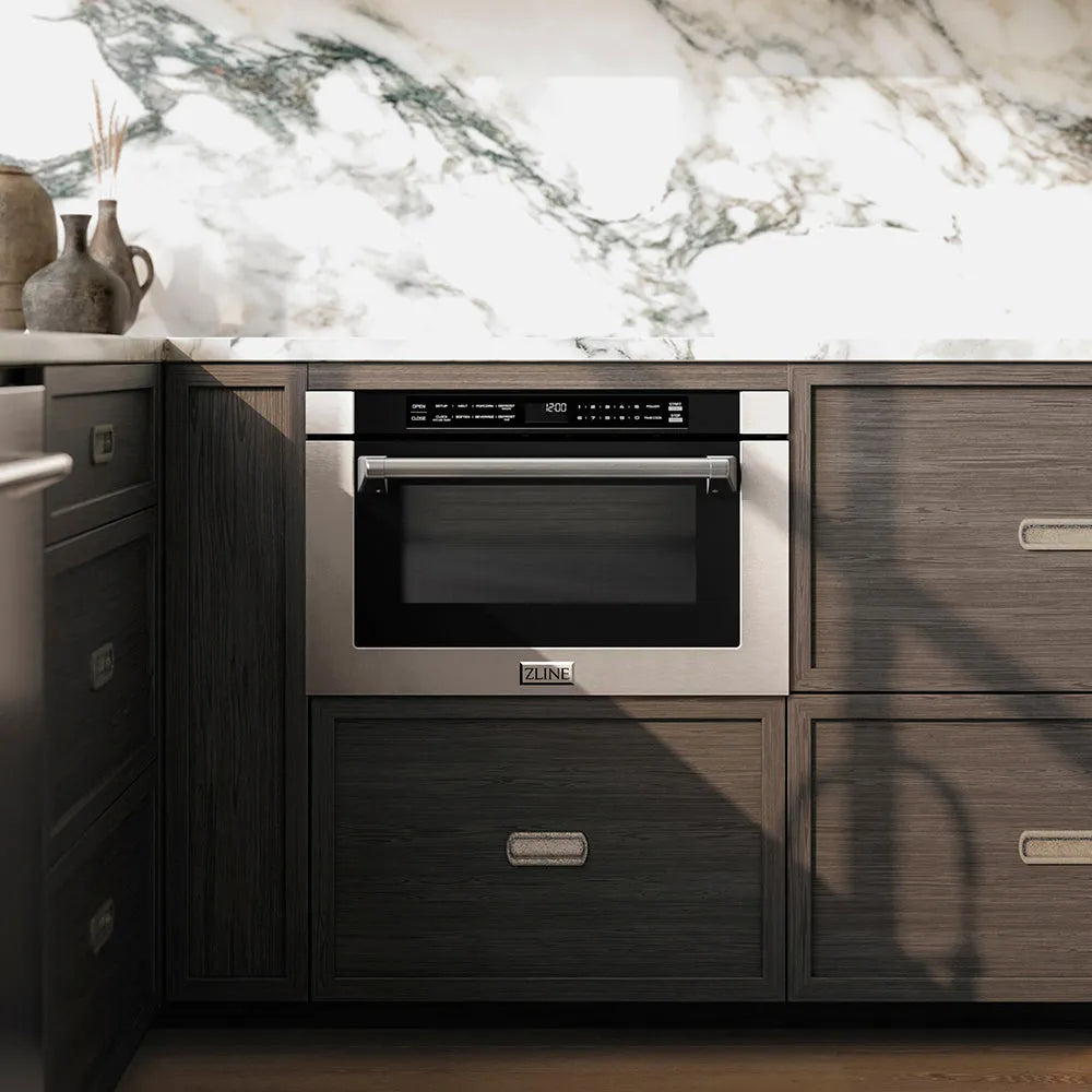 ZLINE 24 in. 1.2 cu. ft. Built-in Microwave Drawer with a Traditional Handle in Stainless Steel (MWD-1-H) embedded in wooden kitchen cabinetry with marble backsplash