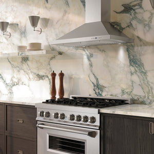Luxury kitchen with ZLINE 36 in. Convertible Vent Wall Mount Range Hood in Stainless Steel (KB-36), stainless steel stove, and marble backsplash
