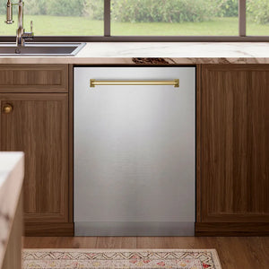 ZLINE Autograph Edition 24 in. Tallac Series 3rd Rack Top Control Built-In Tall Tub Dishwasher in Stainless Steel with Champagne Bronze Handle, 51dBa (DWVZ-304-24-CB) in a kitchen with wooden cabinets and a window view.