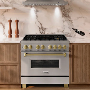 ZLINE Autograph Edition 36 in. 4.6 cu. ft. Legacy Dual Fuel Range with 6 Burner Gas Cooktop and Electric Convection Oven in Stainless Steel and Champagne Bronze Accents (RAZ-36-CB) in a kitchen setting
