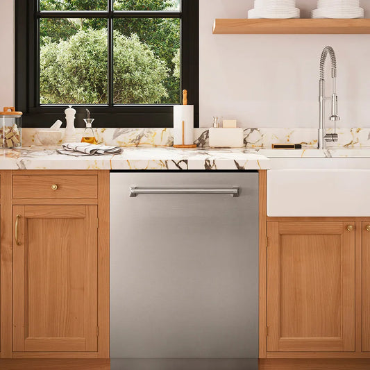 Modern kitchen with wooden cabinets, ZLINE 24 in. Tallac Series 3rd Rack Tall Tub Dishwasher in Stainless Steel, 51dBa (DWV-304-24), and a window view of greenery.
