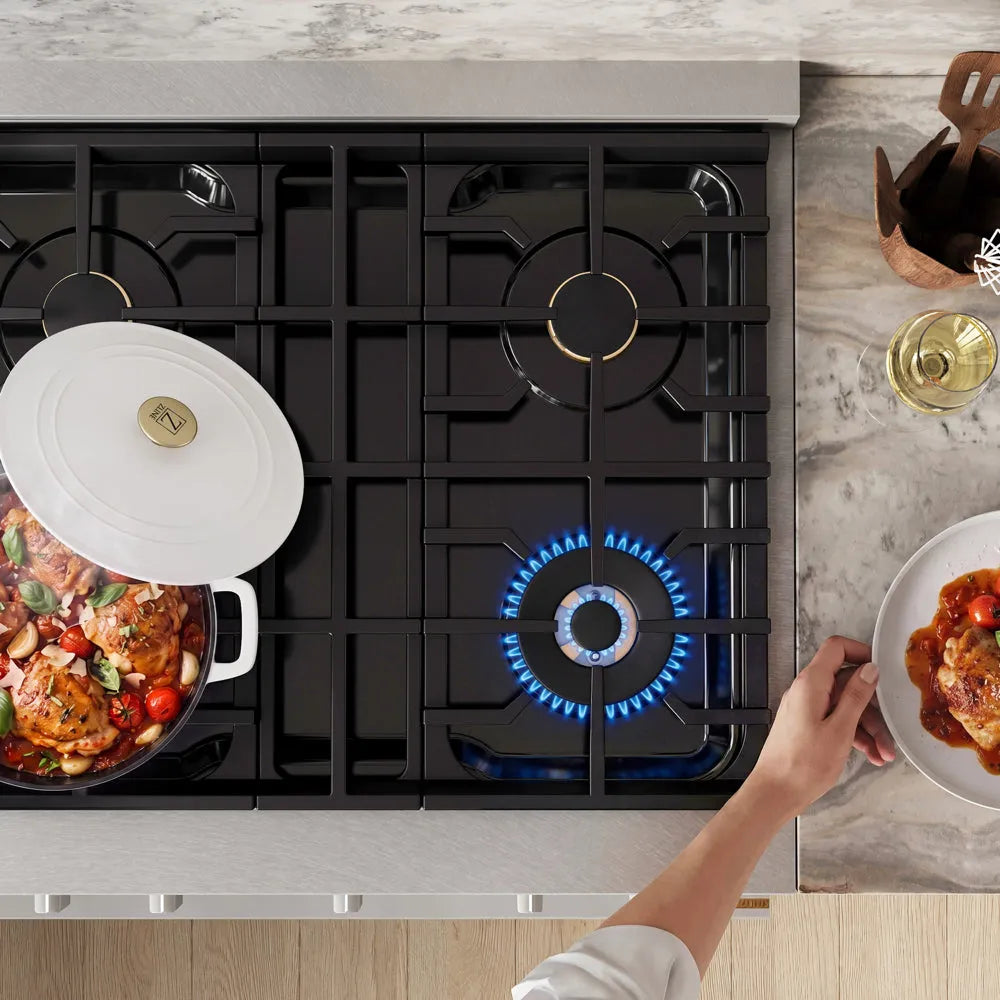 ZLINE 30 in. 4.2 cu. ft. Marino Dual Fuel Range with Gas Cooktop and Electric Convection Oven in Satin Stainless Steel with 4 Brass Burners (MDRS-BR-30) top-down, above cooktop. A white-lidded pot with a colorful food mixture sits on the left burner, while a blue gas flame burns under a pan on the front-right burner.