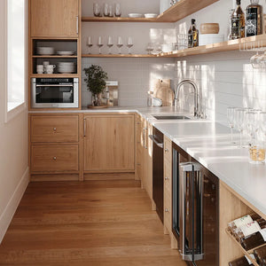 Butler's pantry with wooden cabinets, ZLINE 24 in. 1.2 cu. ft. Built-in Microwave Drawer with a Traditional Handle in Stainless Steel (MWD-1-H), and white countertops.