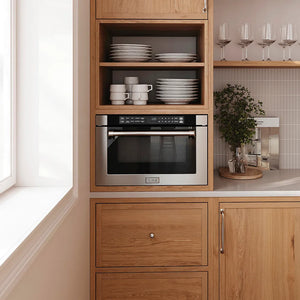 Butler's pantry with wooden cabinets, a ZLINE 24 in. 1.2 cu. ft. Built-in Microwave Drawer with a Traditional Handle in Stainless Steel (MWD-1-H), and decorative items.