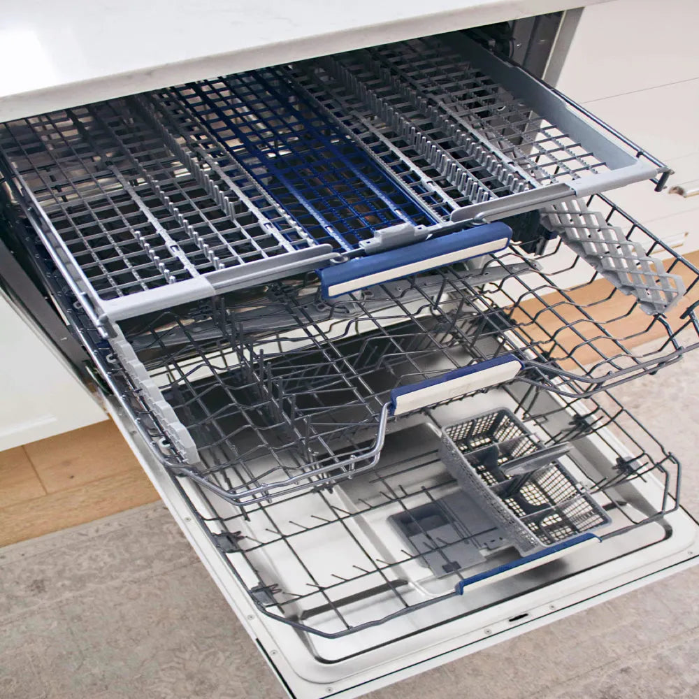 ZLINE 24 in. Tallac Series 3rd Rack Dishwasher with Auto Door Open Drying, 51dBa, Panel Ready (DWV-24) open in a kitchen setting with white cabinets and wooden floor.