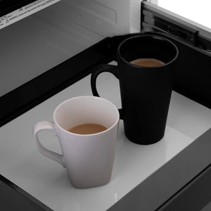 ZLINE Autograph Edition 24 in. 1.2 cu. ft. Built-in Microwave Drawer in Stainless Steel and Champagne Bronze Helix Handle (MWDZ-1-H-KCB) two mugs of coffee inside open microwave drawer.