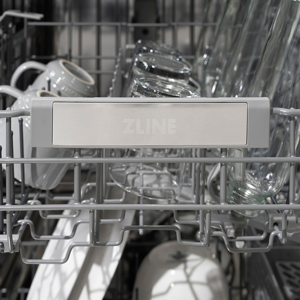 ZLINE Autograph Edition 24 in. Monument Series 3rd Rack Dishwasher with Auto Door Open Drying, 44dBa, Stainless Steel Panel with Polished Gold Handle (DWMTZ-304-24-G) logo on dish rack.