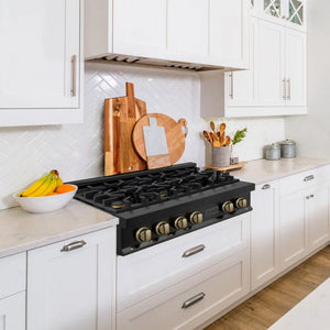 ZLINE Autograph Edition 36 in. Legacy Gas Rangetop with 6 Burners and Porcelain Cooktop in Black Stainless Steel with Champagne Bronze Accents (RTBZ-36-CB) lifestyle, in a luxury kitchen.
