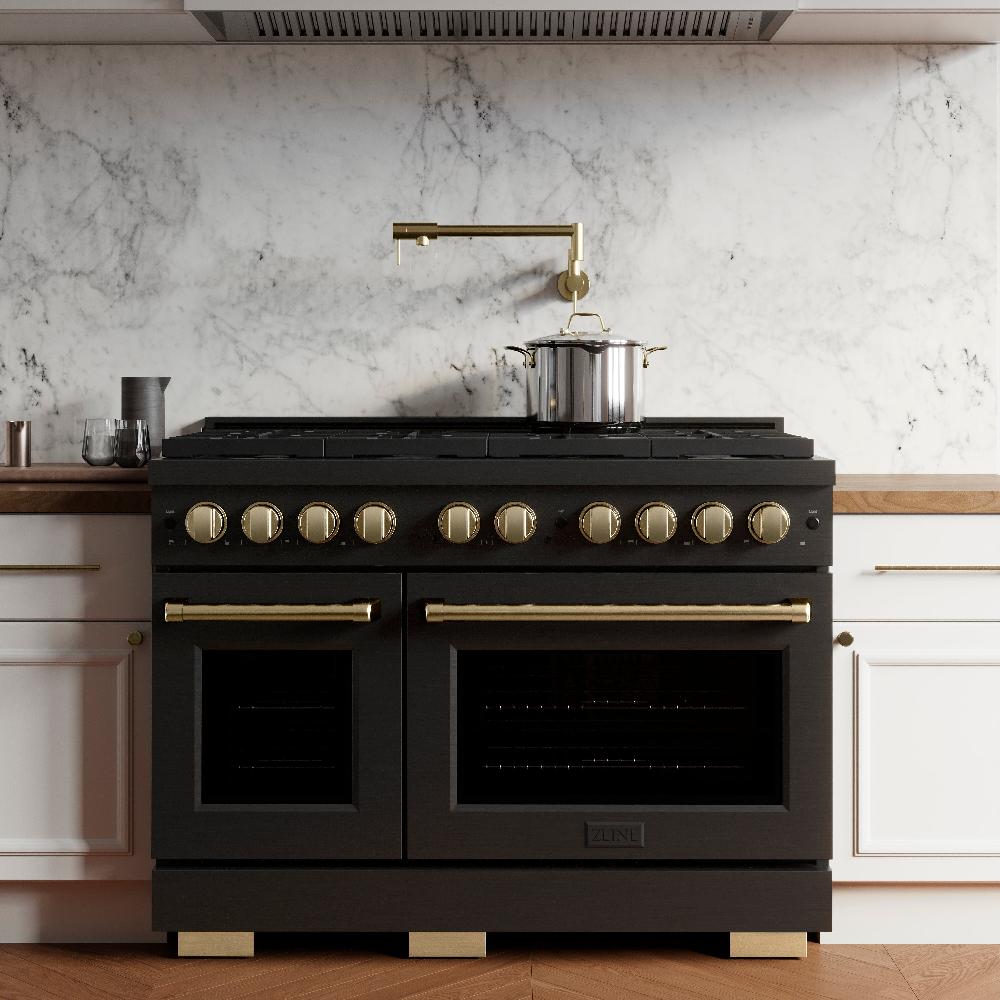 ZLINE Autograph Edition 48 in. 6.7 cu. ft. Paramount Double Oven Dual Fuel Range with 8 Burner Gas Cooktop in Black Stainless Steel and Champagne Bronze Accents (SDRBZ-48-CB) front, in a luxury kitchen.