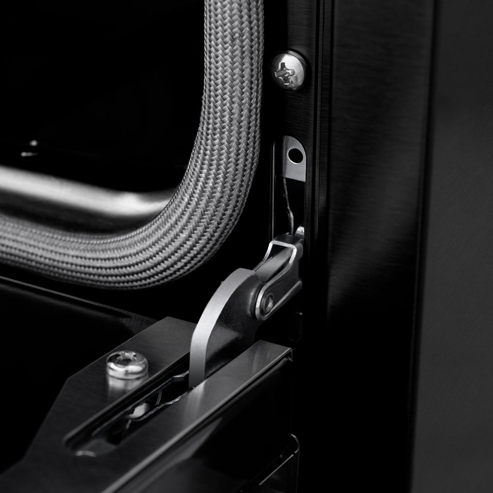 ZLINE Autograph Edition 30 in. 4.2 cu. ft. Paramount Induction Range with 4 Element Cooktop and Electric Convection Oven in Black Stainless Steel with Champagne Bronze Accents (SINRBZ-30-CB) close-up, StayPut oven door hinge.