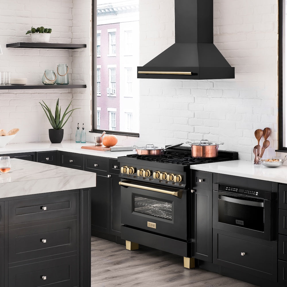 ZLINE 36 in. Black Stainless Steel Range Hood with Polished Gold Handle (BS655Z-36-G) in a luxury kitchen.