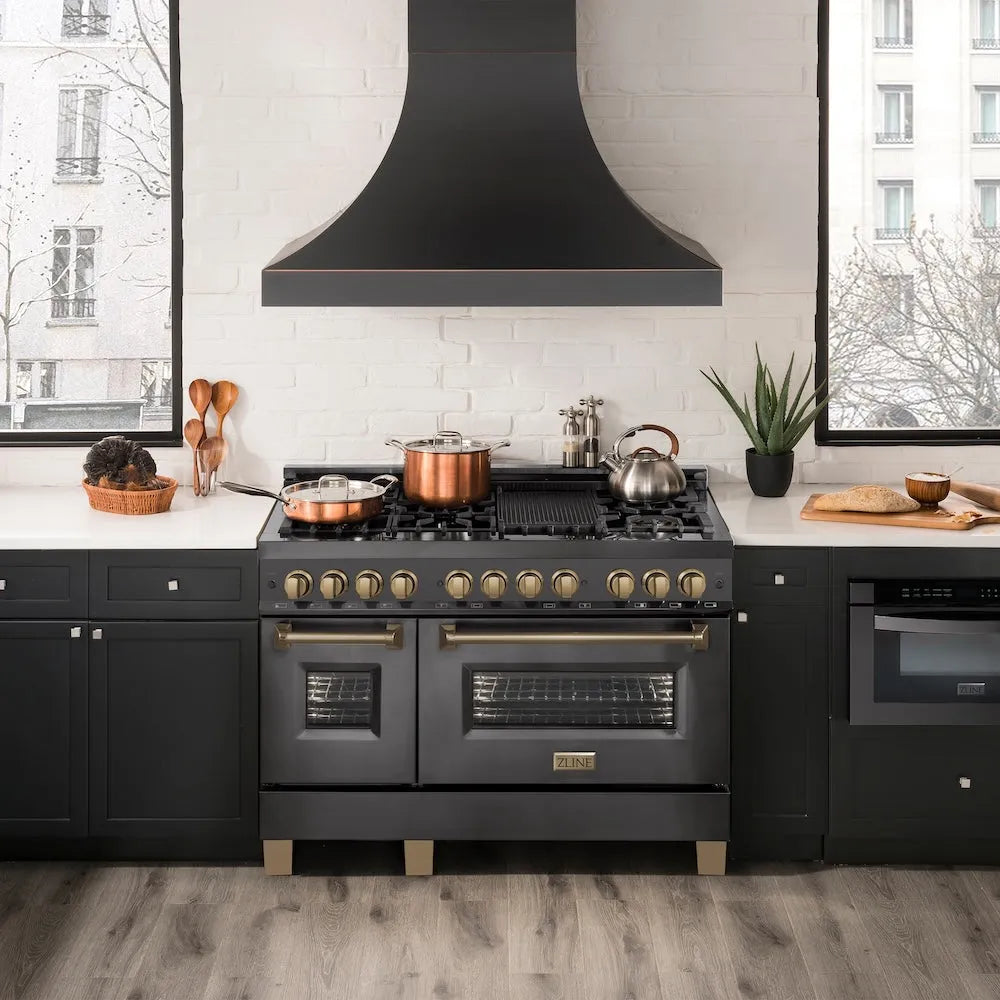Modern kitchen with a ZLINE Autograph Edition 48 in. 6.0 cu. ft. Legacy Dual Fuel Range with 7 Burner Gas Cooktop and 2 Electric Ovens in Black Stainless Steel and Champagne Bronze Accents (RABZ-48-CB)