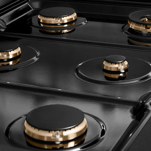 ZLINE Autograph Edition 36 in. Paramount Gas Rangetop with 6 Burners and Porcelain Cooktop in Black Satin Stainless Steel with Polished Gold Accents (SRTBSZ-36-G) black porcelain cooktop and burners with no grates.