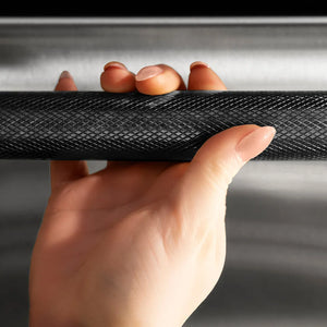 ZLINE 24 in. Dishwasher Helix Handle (Set of 1) in Black Stainless Steel (DWHZ-K-BS-24) on appliance showing diamond knurled details.
