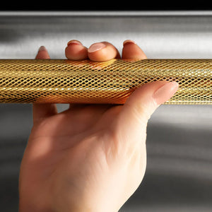 ZLINE Autograph Edition 24 in. Dishwasher Helix Handle (Set of 1) in Polished Gold (DWHZ-K-G-24) on appliance showing diamond knurled details.