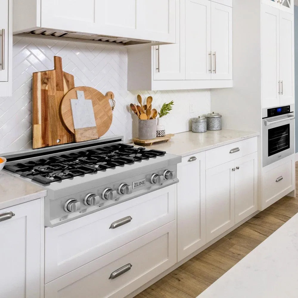 ZLINE Kitchen Package with 36 in. Stainless Steel Rangetop and 30 in. Single Wall Oven (2KP-RTAWS36) in a cottage-style kitchen.