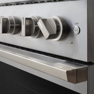 ZLINE 36 in. 5.2 cu. ft. Marino Dual Fuel Range with 6 Burner Gas Cooktop and Electric Convection Oven in Satin Stainless Steel (MDRS-36) close-up, oven and cooktop knobs.