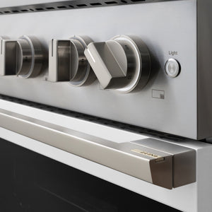 ZLINE 36 in. 5.2 cu. ft. Marino Gas Range with 6 Burner DuoPro™ Cooktop and Convection Gas Oven with White Matte Door (PMGR-WM-36) close-up, modern oven and cooktop knobs.
