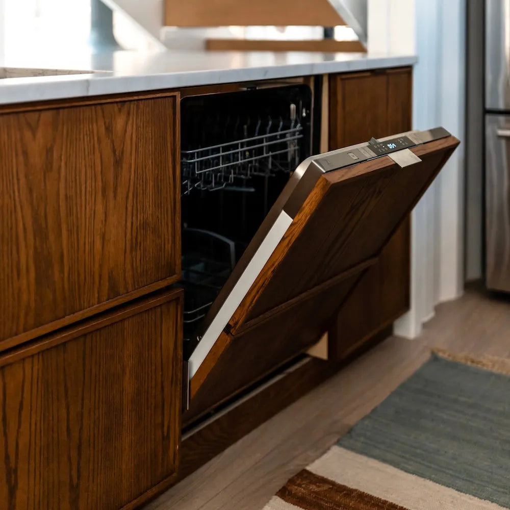 Open ZLINE 24 in. Tallac Series 3rd Rack Tall Tub Dishwasher in Custom Panel Ready with Stainless Steel Tub, 51dBa (DWV-24) in a kitchen with wooden cabinets
